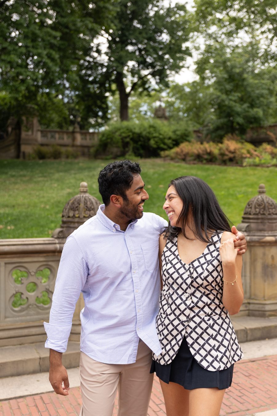 Akshay and Daniela laughing together on Bethesda Terrace